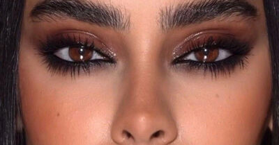  Un trucco occhi caratterizzato da tonalità marroni sfumate per creare un effetto 'fumoso' e intenso. 